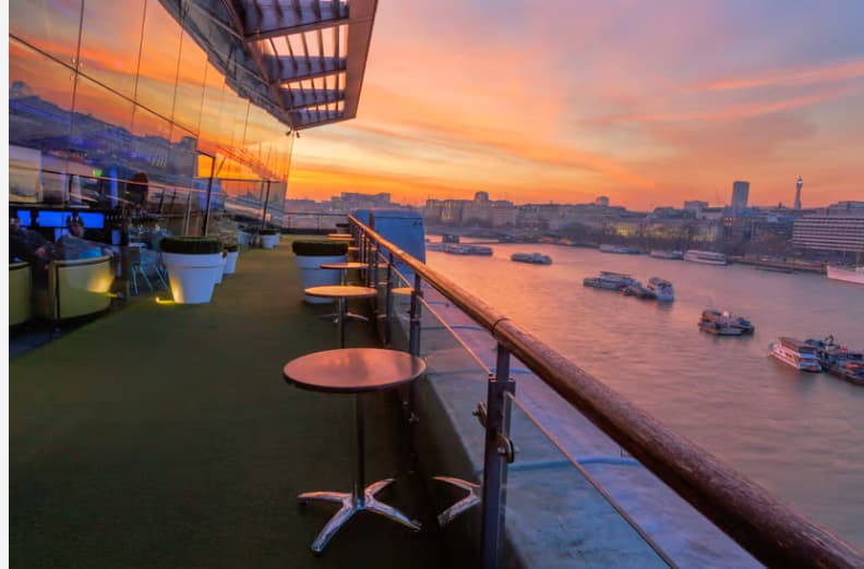 Oxo Tower rooftop event, panoramic river views, cocktails, networking