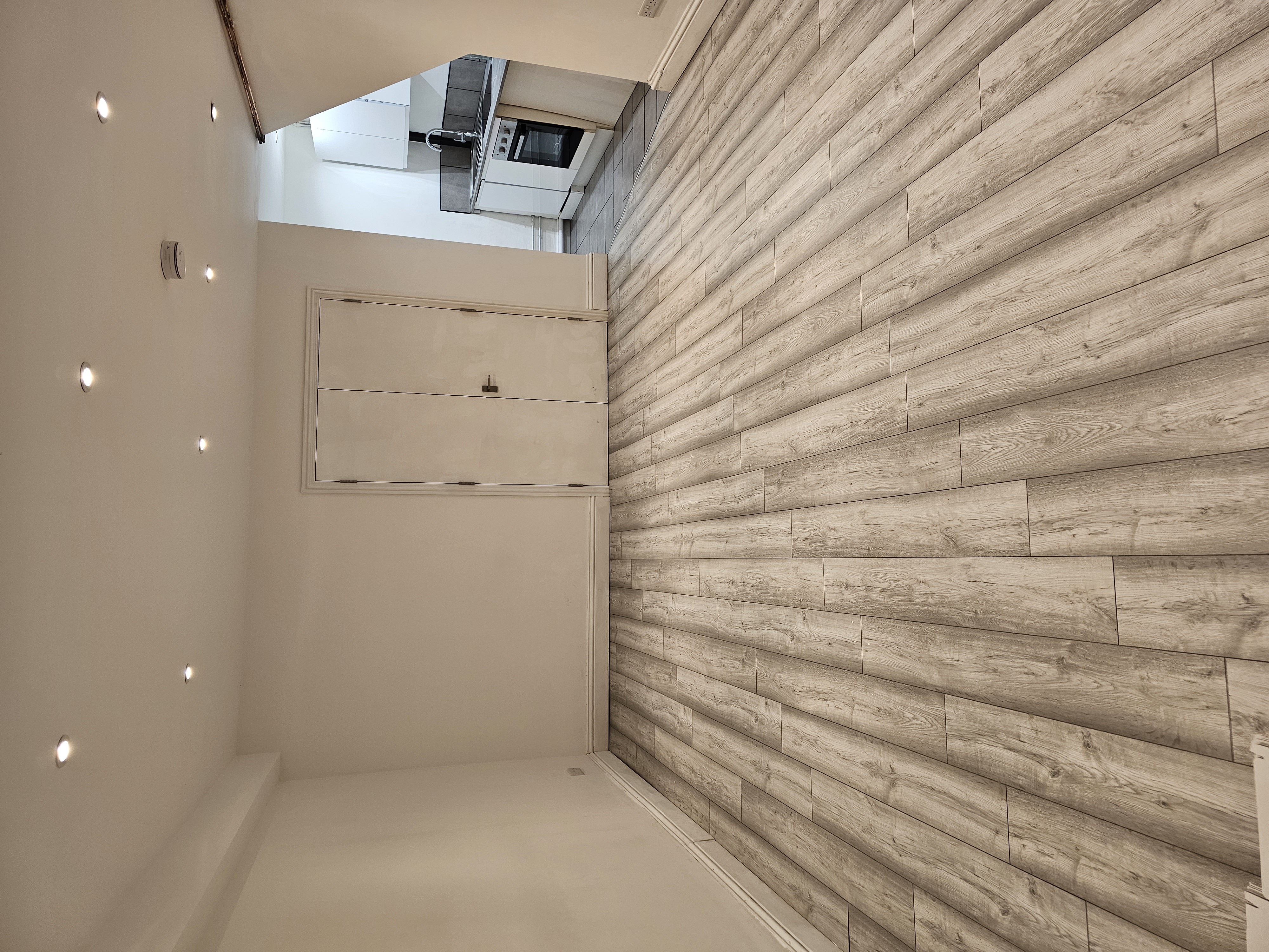 Versatile lounge space with neutral tones for intimate meetings and small events.