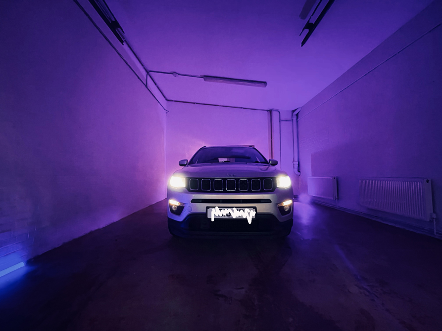 Sleek vehicle in purple-lit Studio 2, perfect for product launches and VIP events.