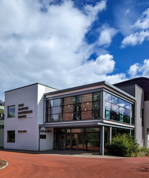 Modern South Hall Complex with large glass windows, ideal for corporate events and gatherings.