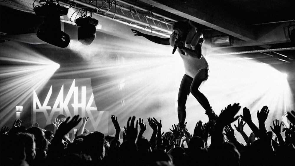 Dynamic live performance at SWG3 photography studio, engaging audience experience.