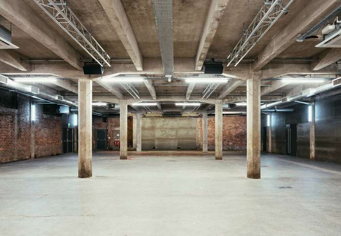 Versatile SWG3 photography studio with industrial decor for events and exhibitions.