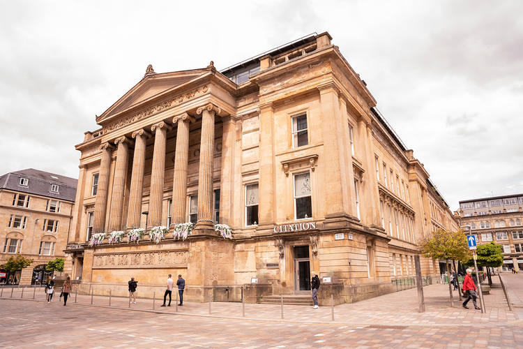 Grand historic venue in Citation Glasgow with impressive columns for upscale events.