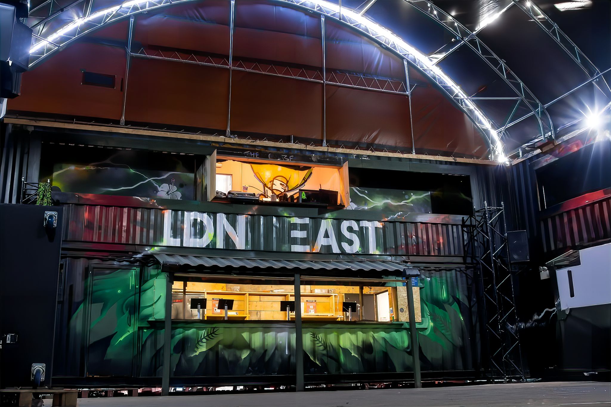 Dynamic event space in LDN East with vibrant stage, ideal for creative gatherings.