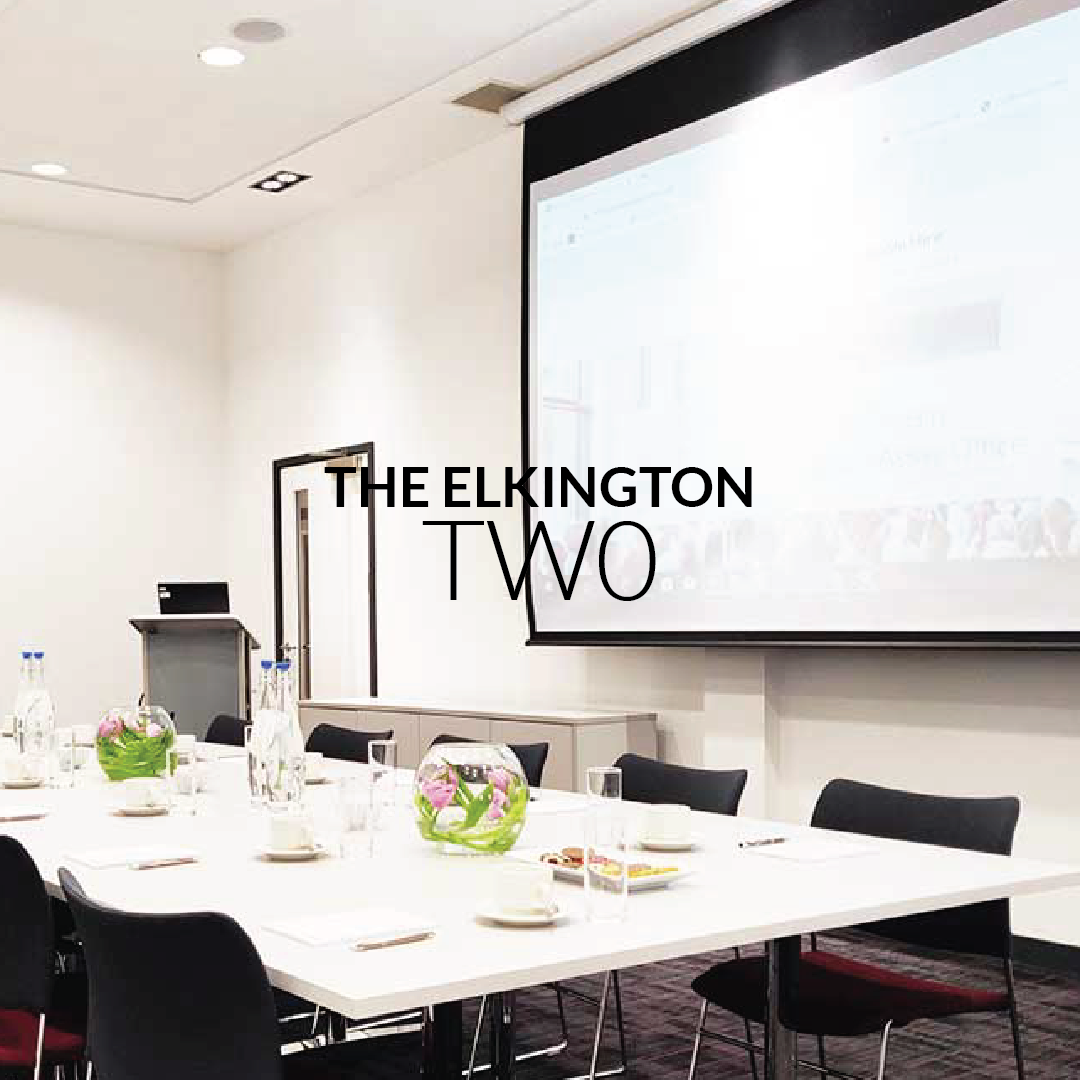 Elkington Suite: modern meeting room with long table, ideal for corporate events and workshops.