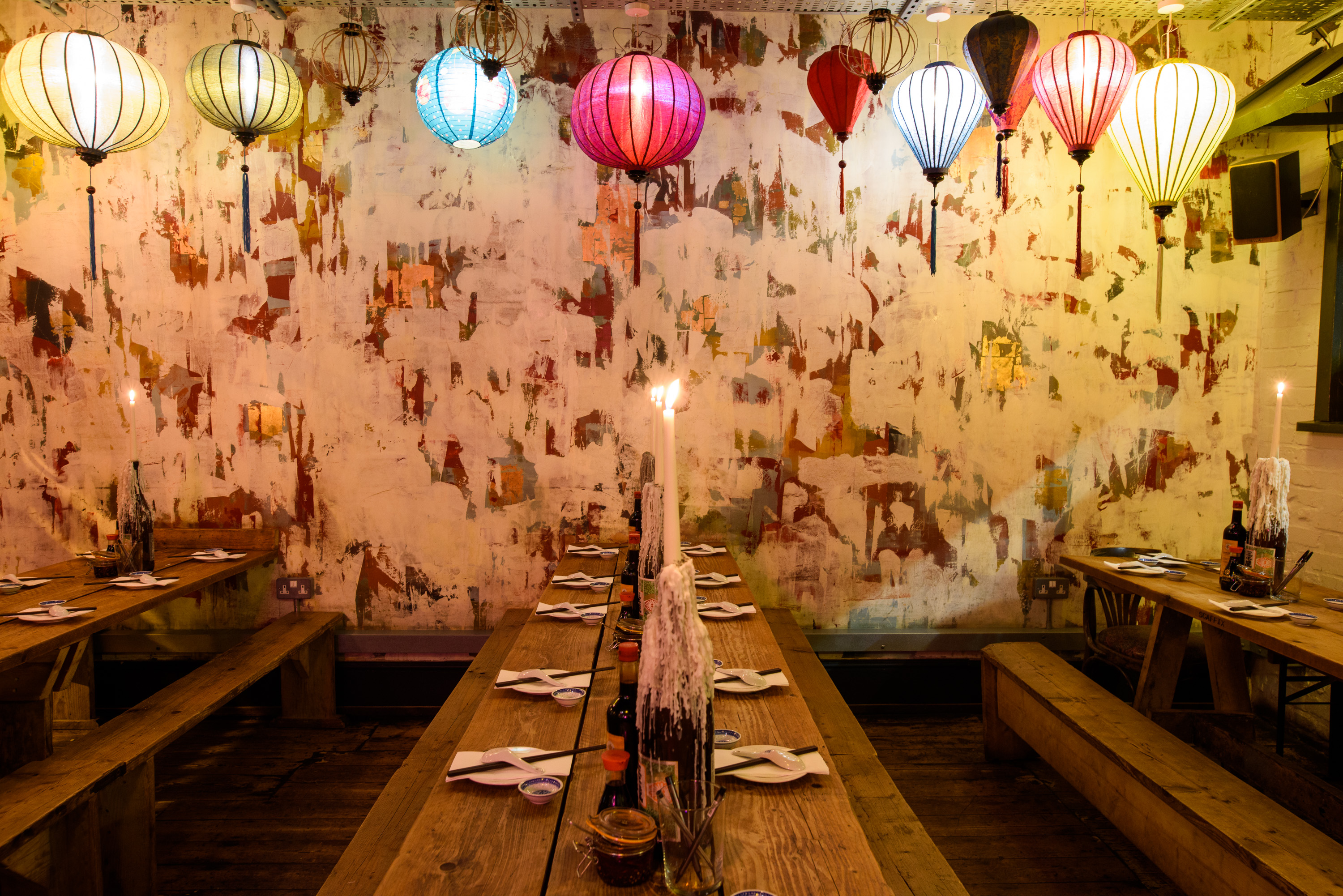 Hanging Garden Room with colorful lanterns, ideal for intimate gatherings and events.