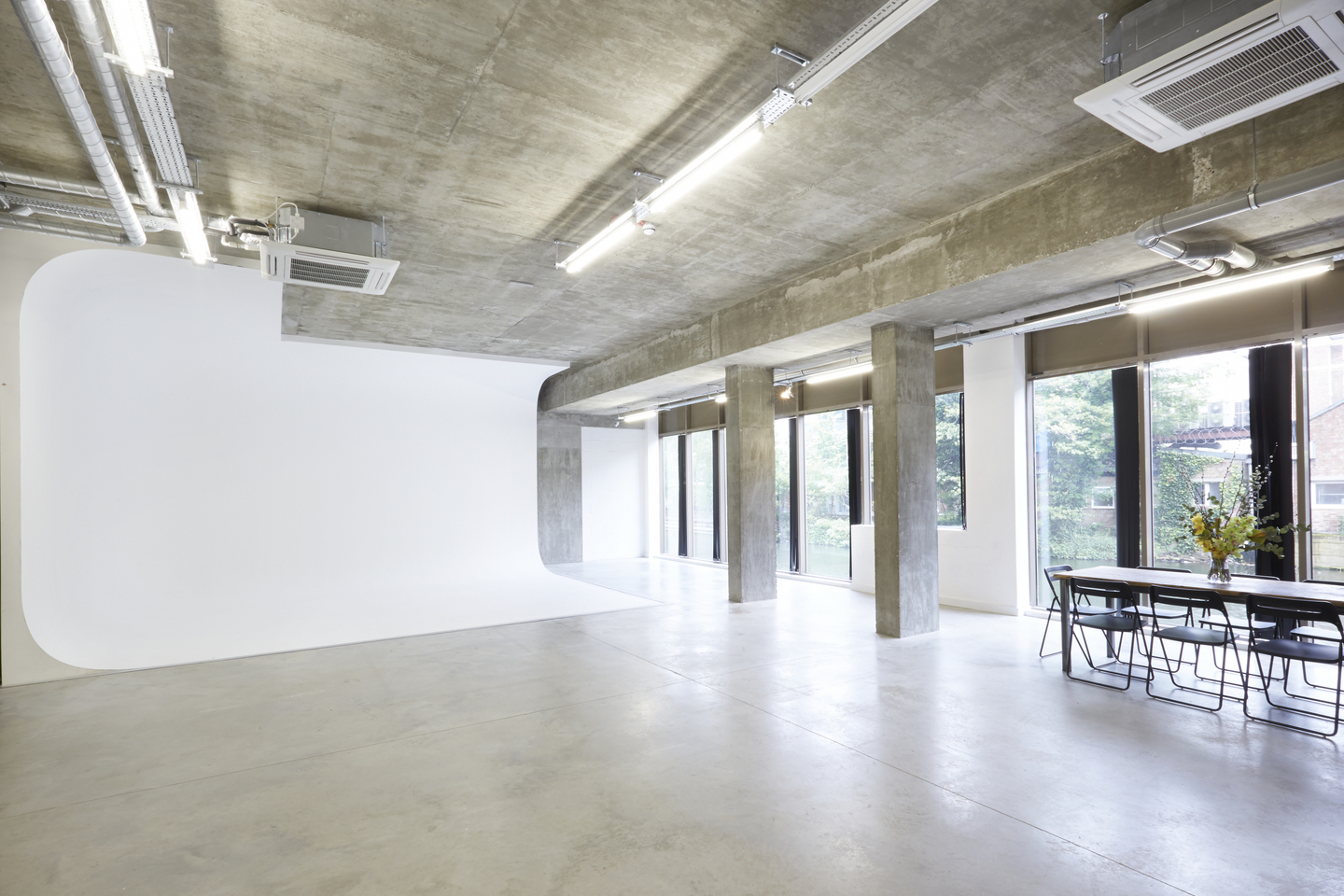 Versatile event space in LOCK Studios with modern industrial design for meetings and workshops.