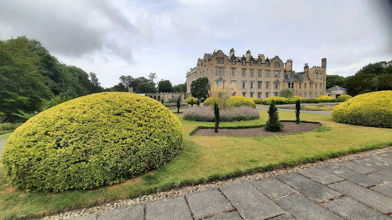 Stunning Newbattle Abbey venue with lush gardens for weddings and events.