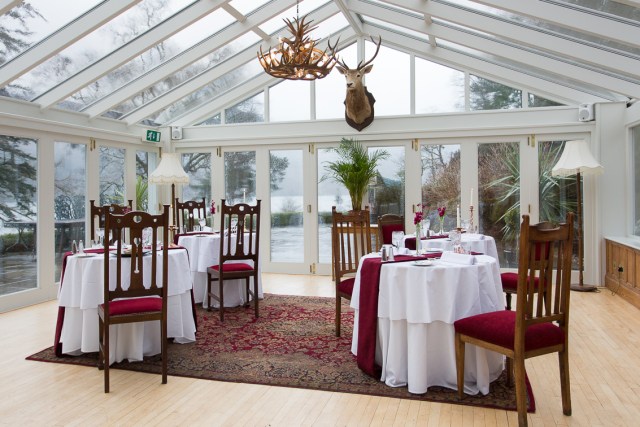 Elegant event space with round tables, ideal for intimate gatherings and upscale dining.