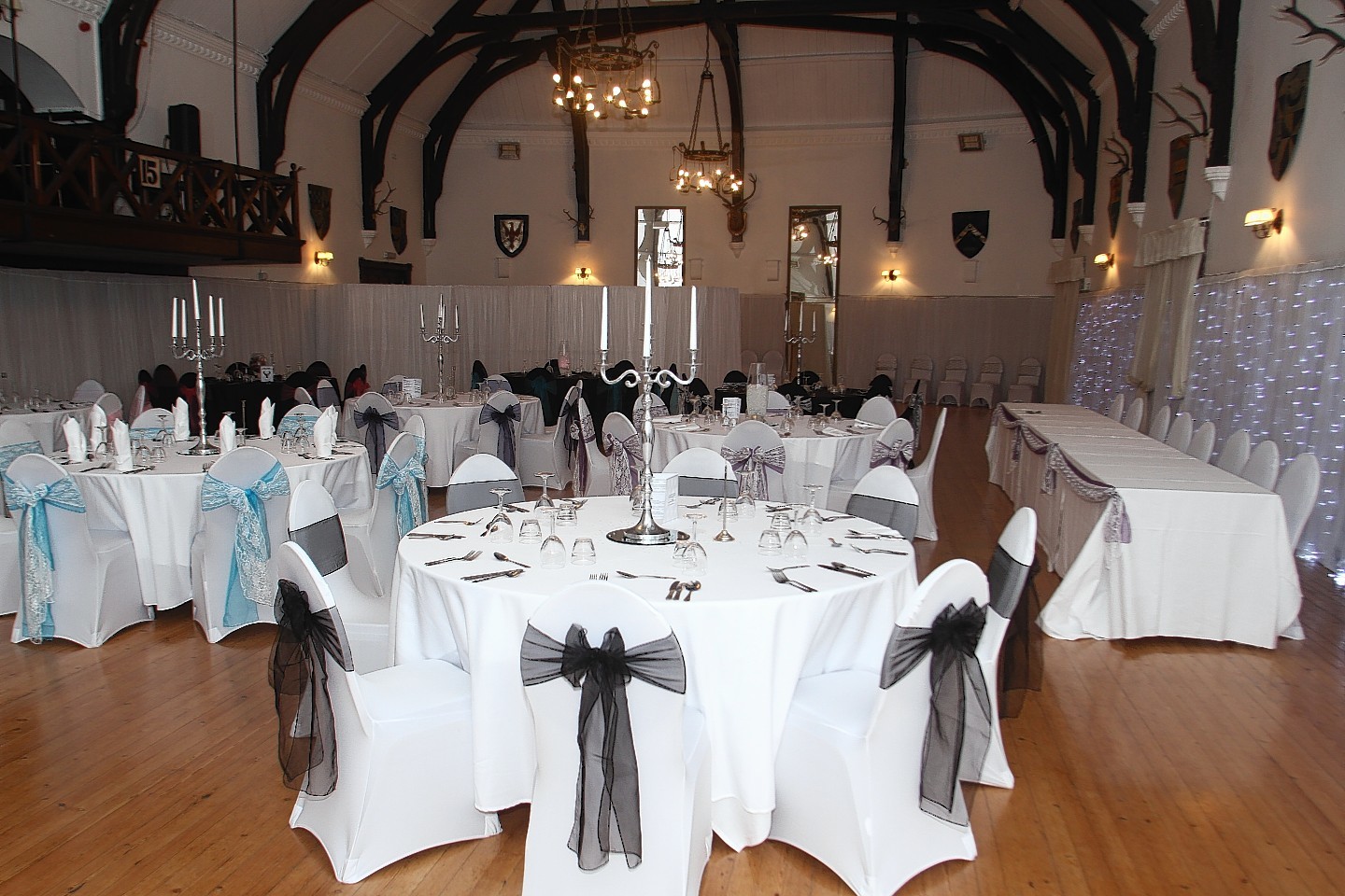 Ballroom at Argyllshire Gathering with elegant tables for weddings and formal events.