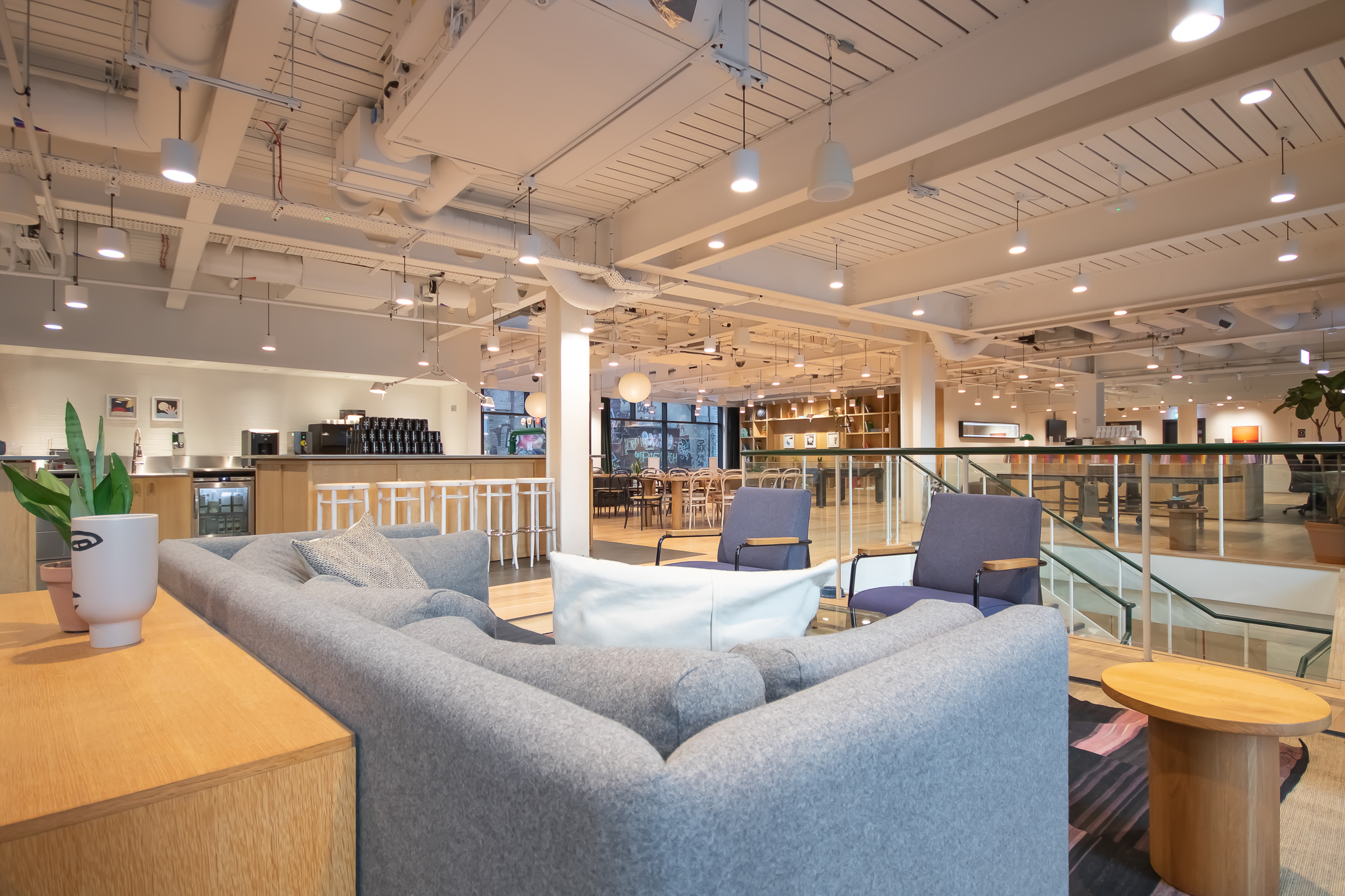 Modern event space in Shoreditch with cozy seating for networking and meetings.