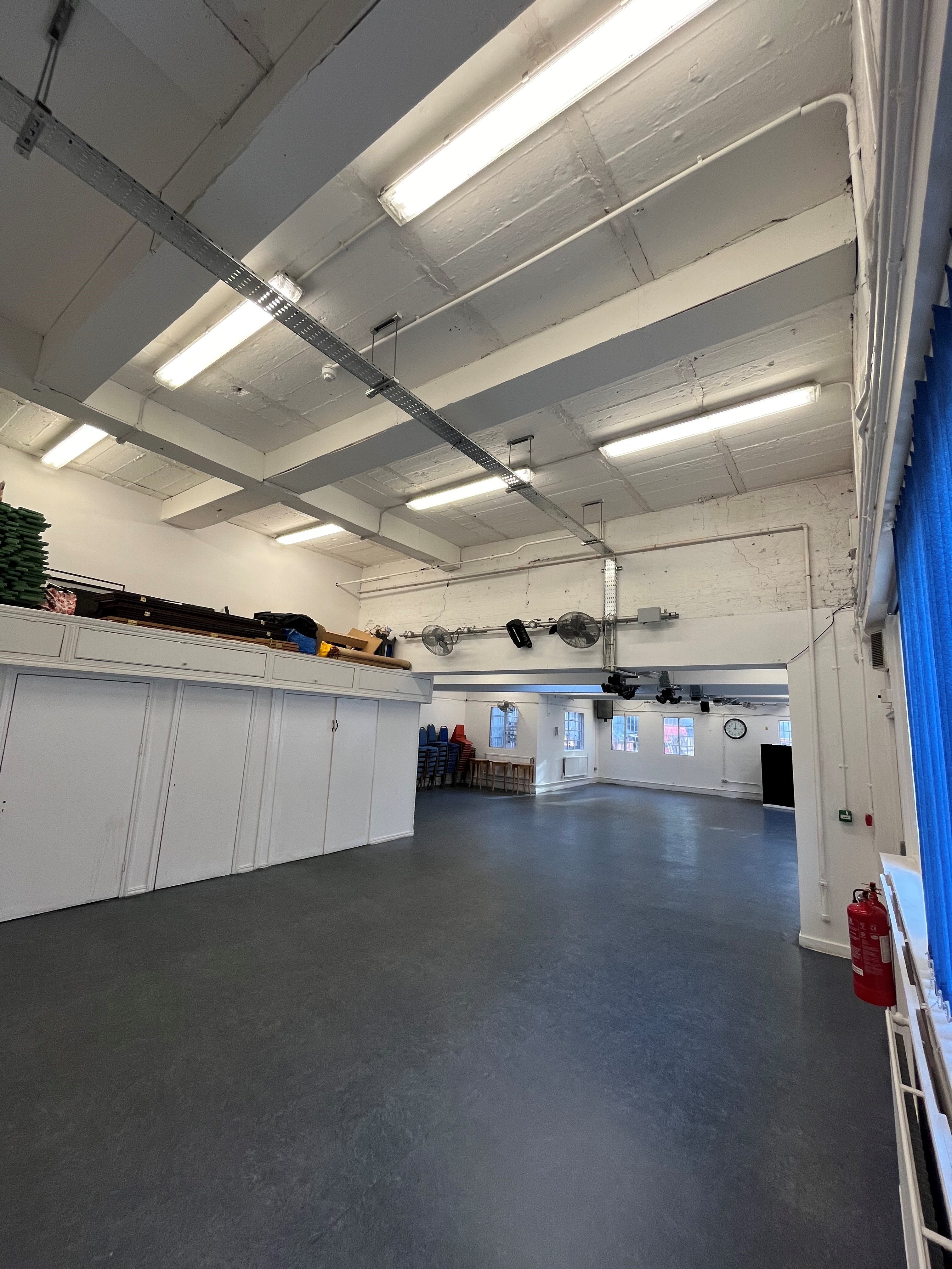 Main Hall at VGCC with high ceilings, perfect for workshops and gatherings.