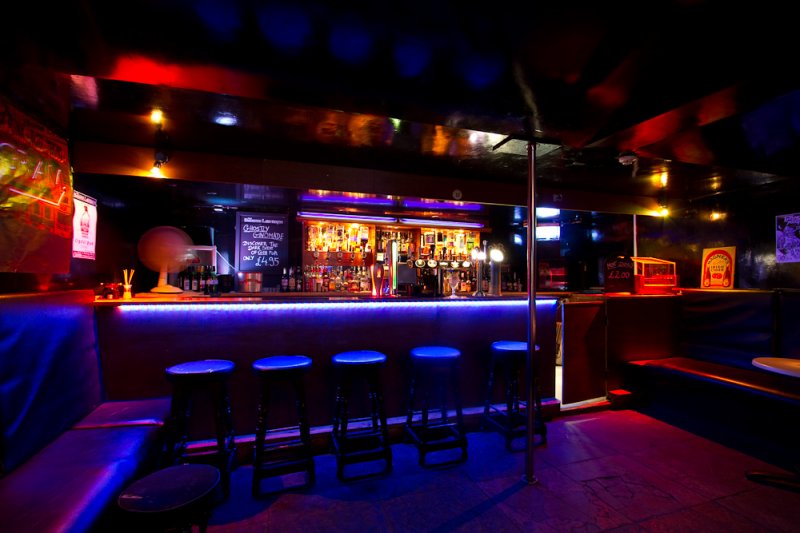 Stylish Bar 13 Edinburgh with vibrant lighting, ideal for networking events and gatherings.