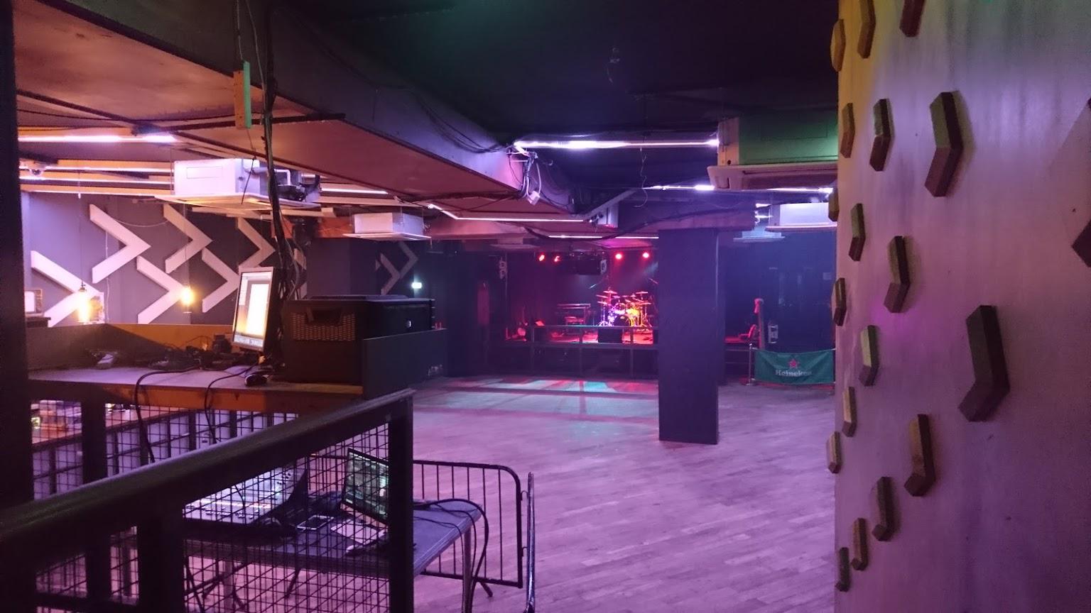 Main Room at La Belle Angele: versatile event space with modern industrial vibe for performances.