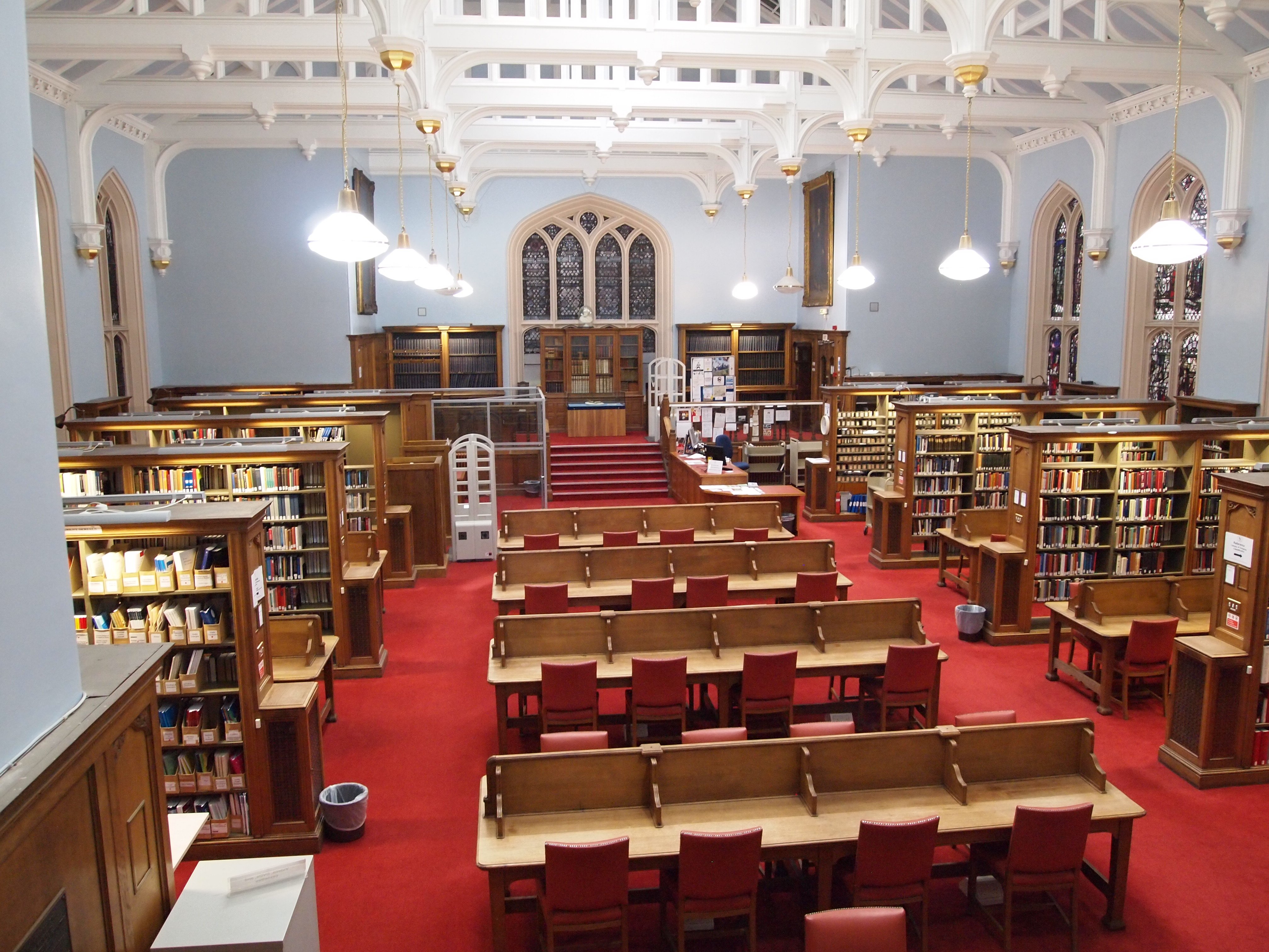 Spacious University of Edinburgh library, ideal for meetings and events with elegant architecture.