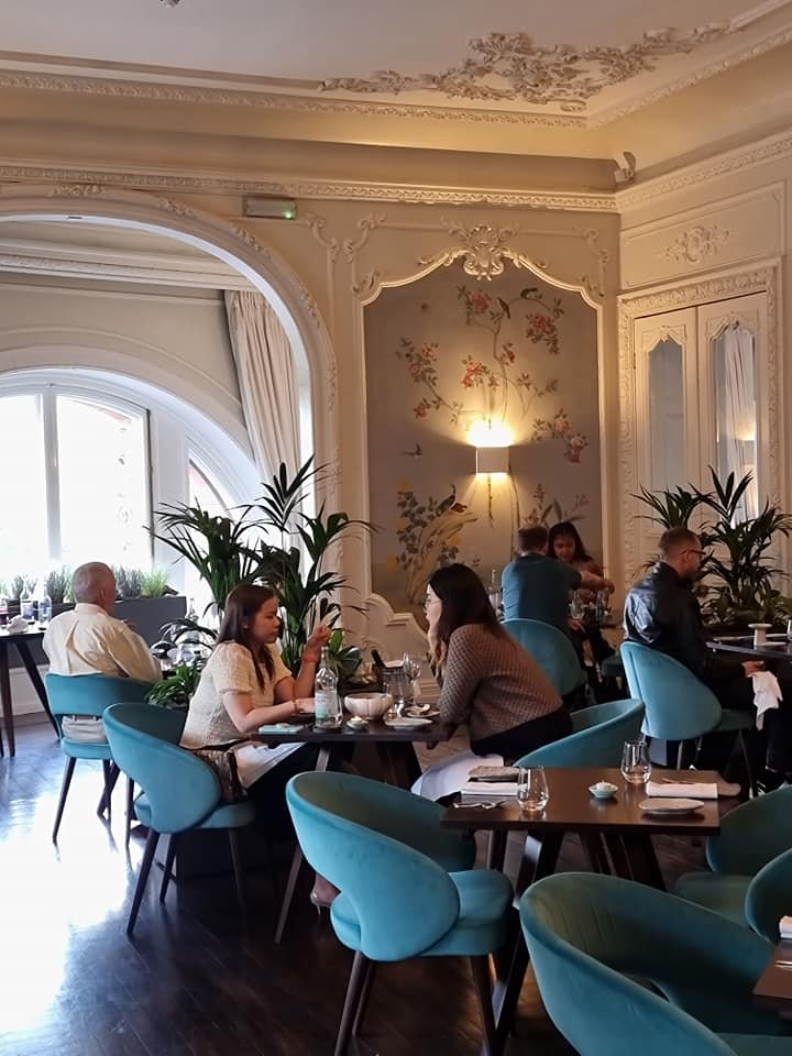 Stylish restaurant The Pompadour, ideal for networking events with modern decor.