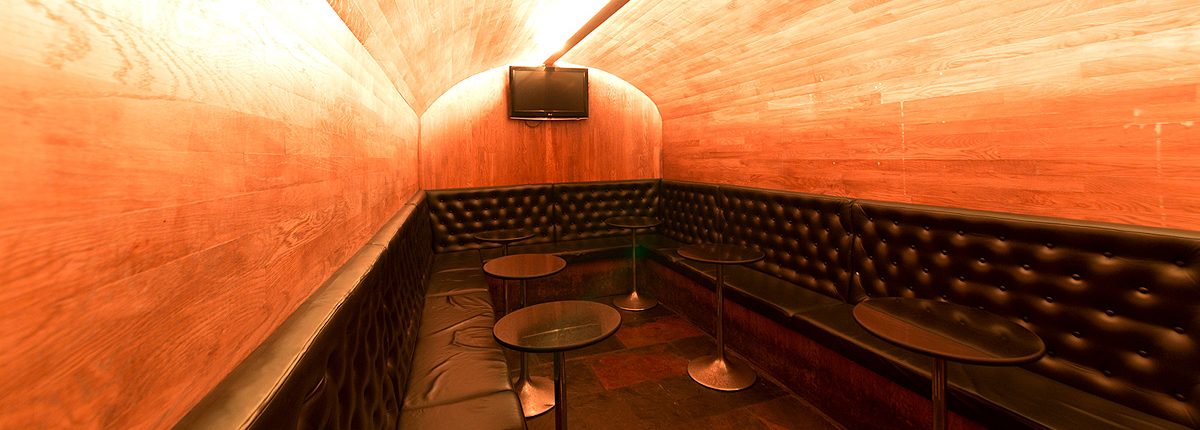 Cozy lounge at Whistle Binkies, ideal for private events and gatherings.