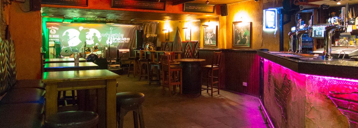 Cozy Cave venue in Whistle Binkies, ideal for live music and intimate gatherings.