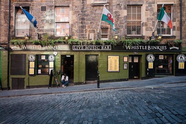 Charming Cave venue with greenery, perfect for live music and informal gatherings.