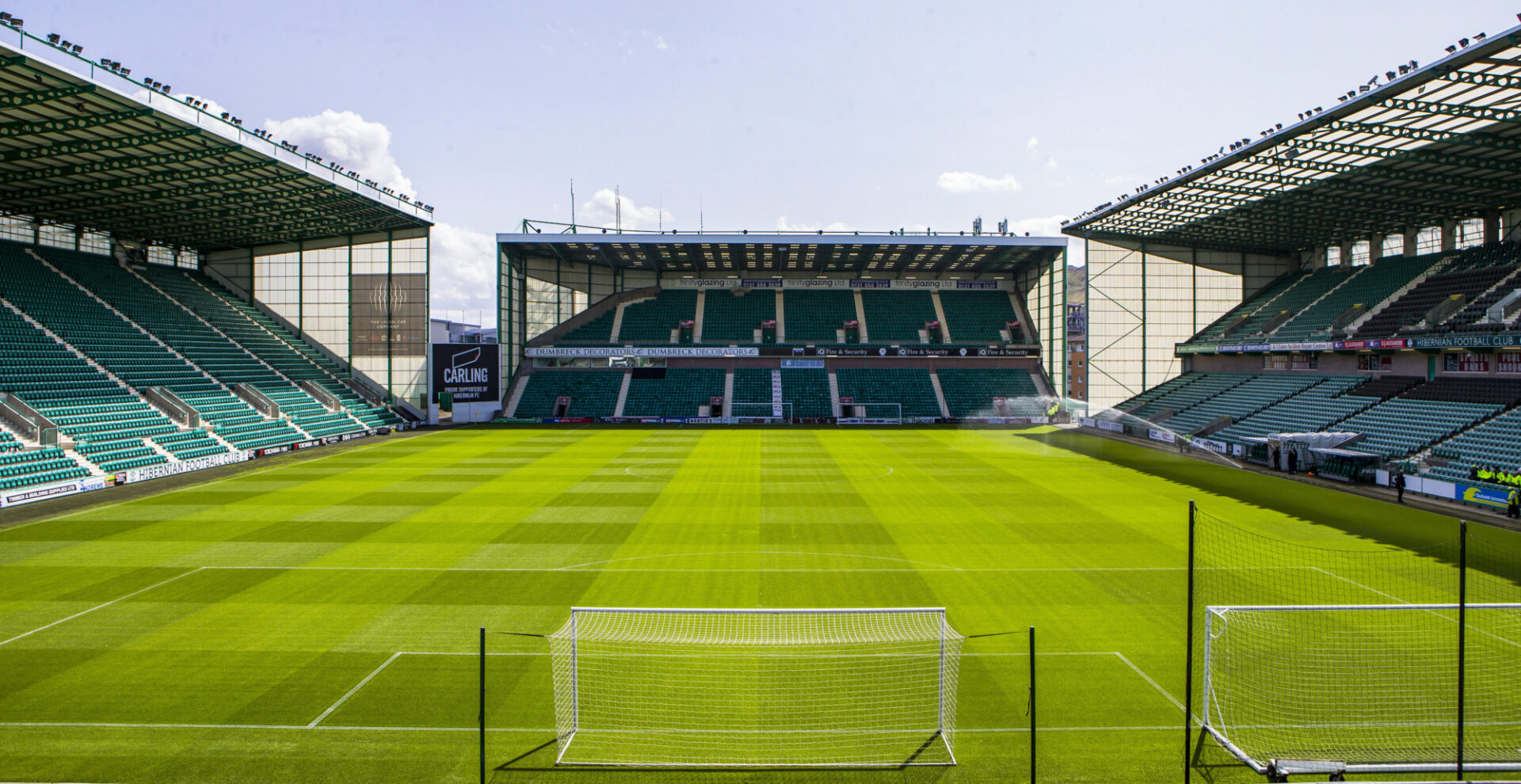 Hibernian FC stadium with green field, ideal for sports and corporate events.