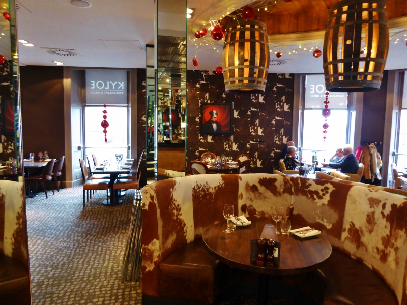 Private dining room at Kyloe Steak Restaurant, cozy booth, ideal for intimate events.