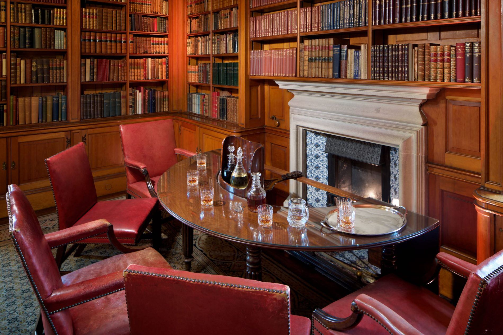 Scottish Library in Barnbougle Castle with polished table, ideal for meetings and events.