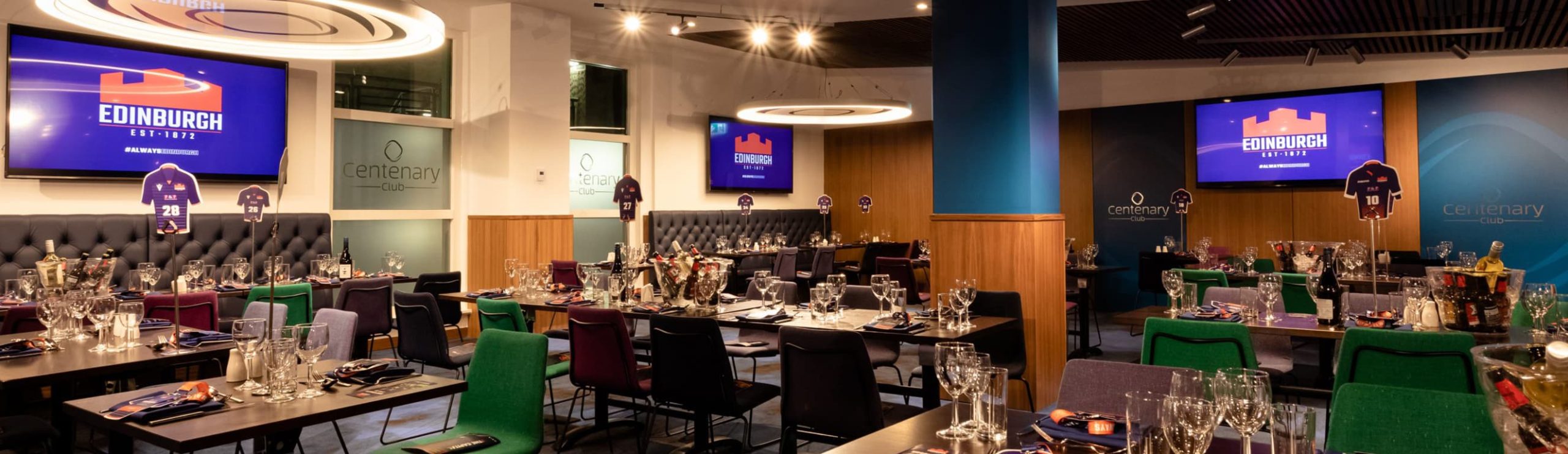 Centenary Club event space with elegant tables, ideal for corporate meetings and gatherings.