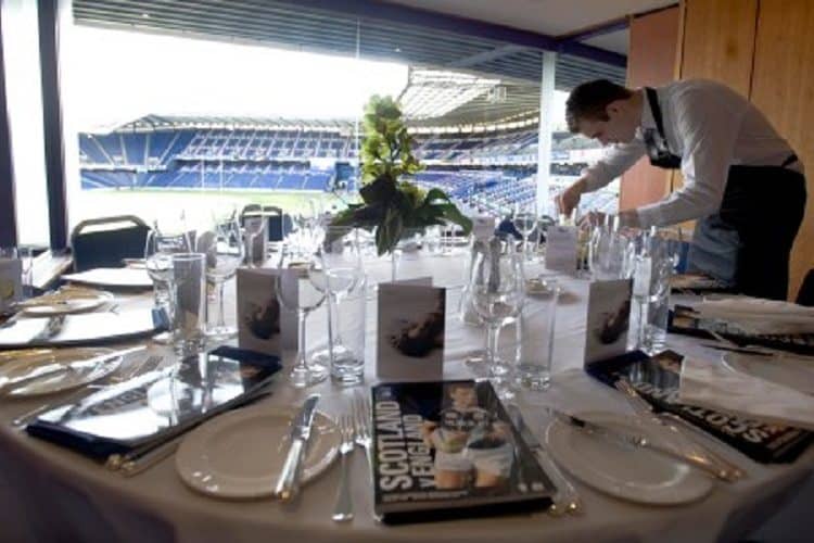 Murrayfield Boxes dining setup for corporate events with elegant table and sports view.