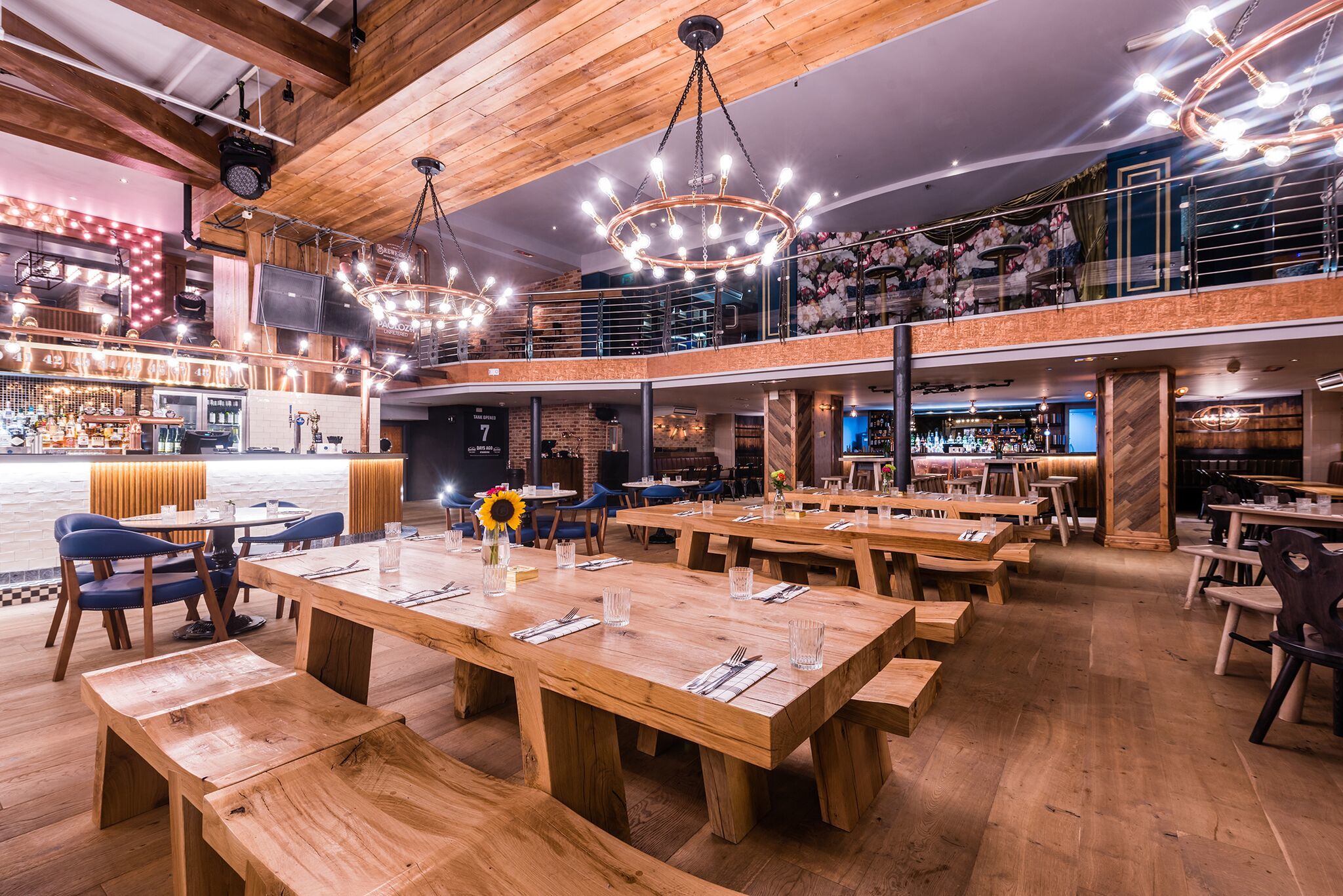 Modern Beer Palace in Brewhemia, featuring warm wood decor for events and dining.