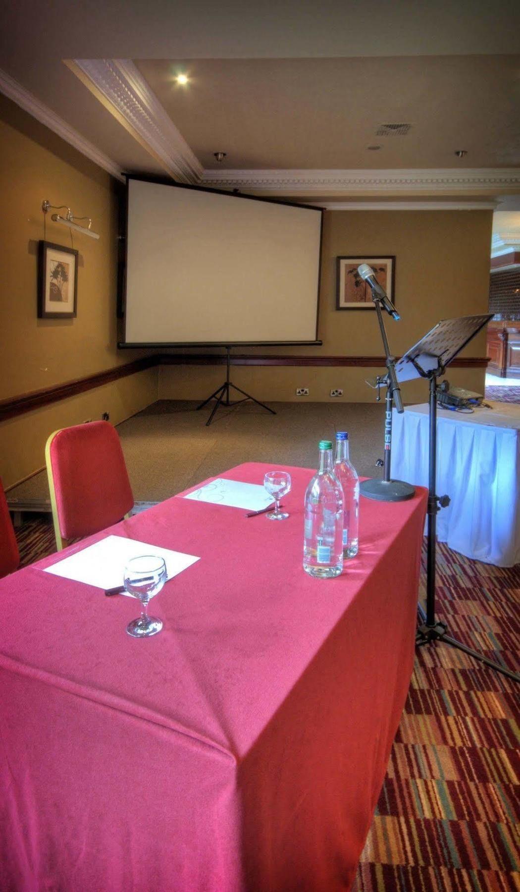 Conference Suite at Dean Park Hotel with red tablecloth, ideal for meetings and presentations.