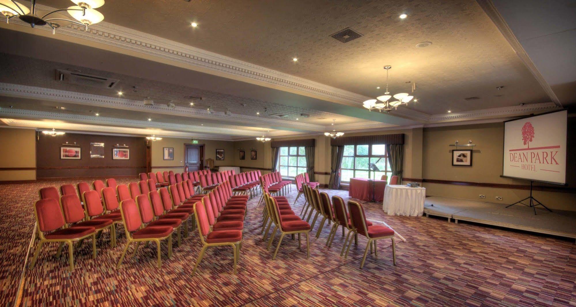 Conference Suite at Dean Park Hotel with red chairs, perfect for events and workshops.