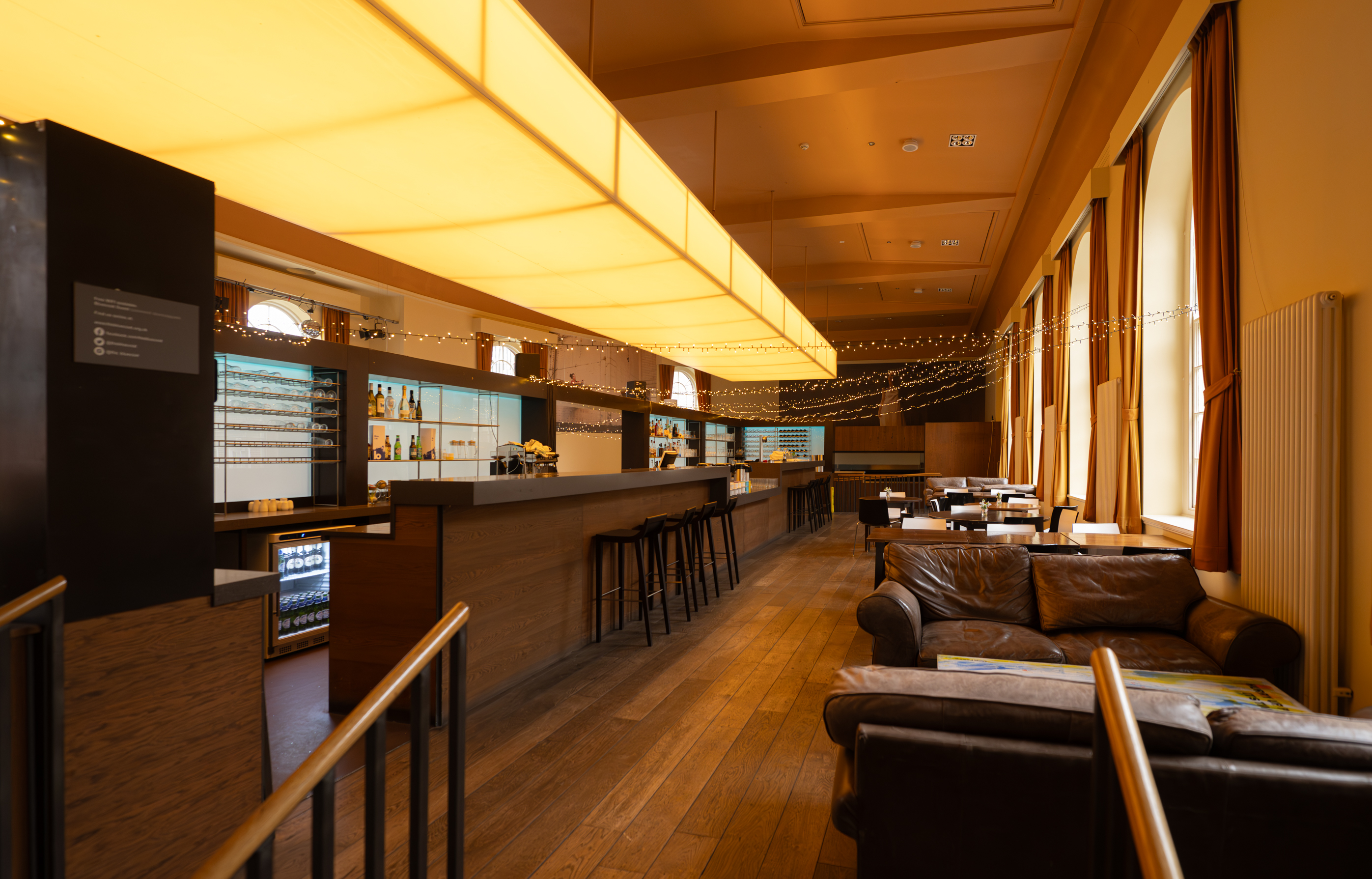 Stylish event space at The Bistro, modern bar, ideal for cocktail receptions and gatherings.