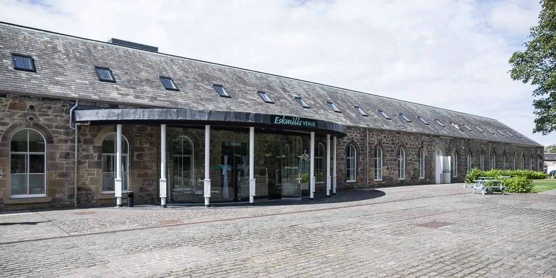 Glass Atrium at Eskmills Venue, modern entrance, ideal for meetings and events.