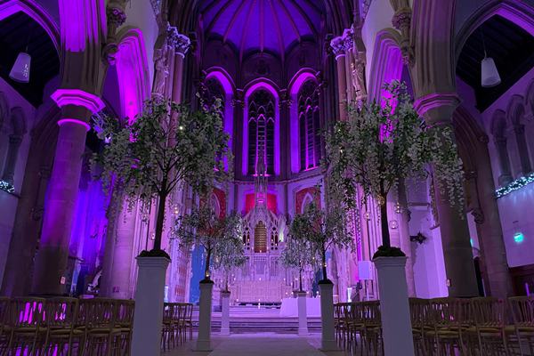Exclusive Use Venue Hire in Manchester Monastery with purple lighting, ideal for weddings and events.