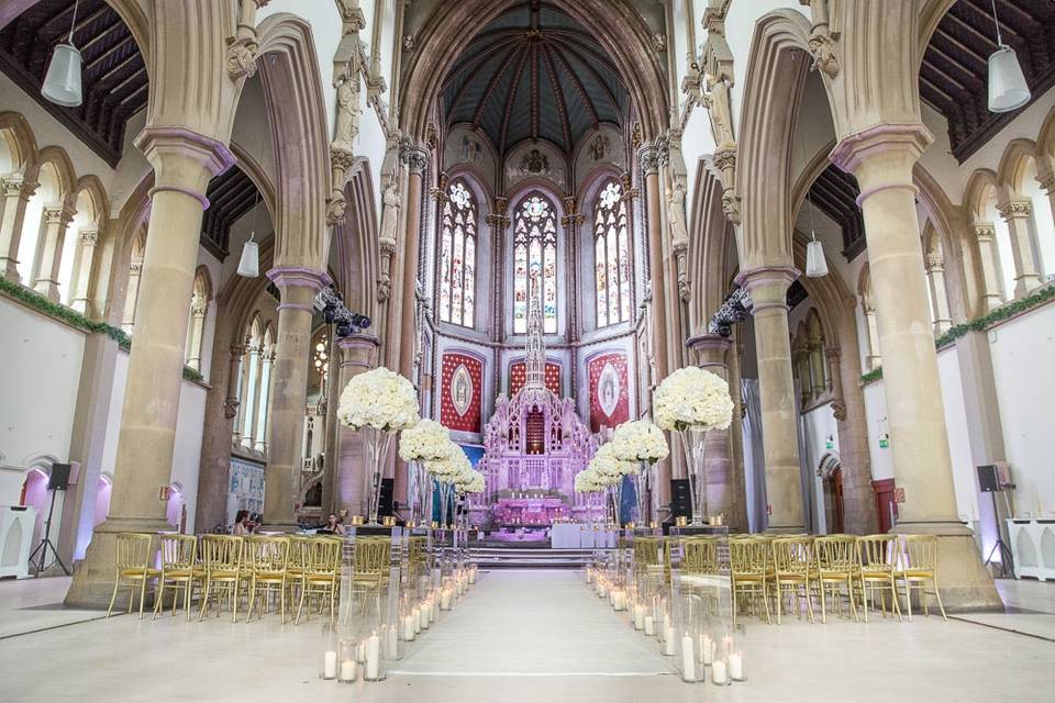Elegant Manchester Monastery venue with floral decor, ideal for weddings and events.