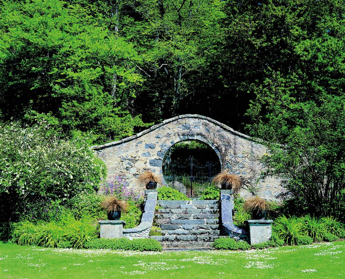 Stone archway in Secret Garden, Leith Arches; ideal for weddings and retreats.