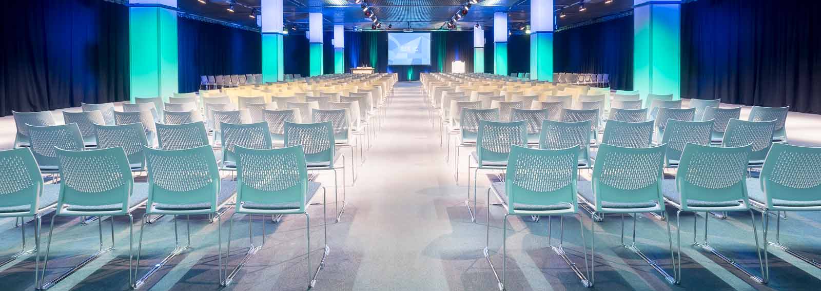 SEC Meeting Academy event space with modern chairs, ideal for conferences and presentations.