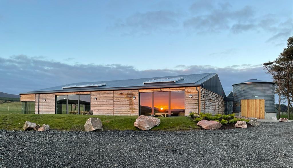 Modern rustic venue in Cairns Farm Estate with large windows for events and meetings.