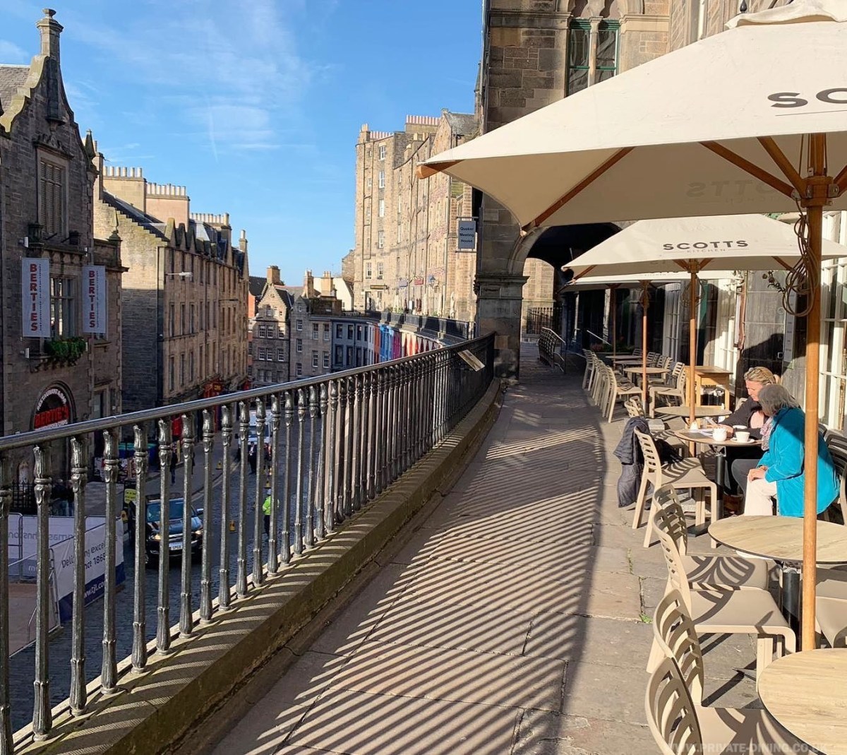 Outdoor terrace at Scotts Kitchen, sunlit café ideal for networking events and casual meetings.