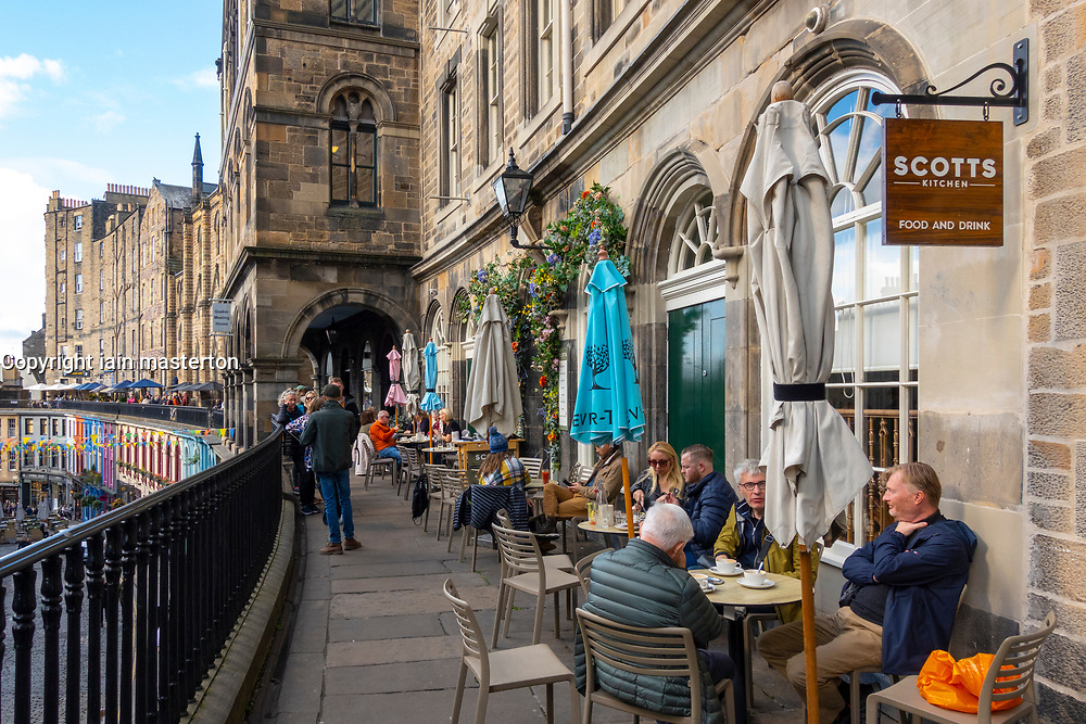 Outdoor terrace at Scotts Kitchen, vibrant waterfront dining for summer events and gatherings.