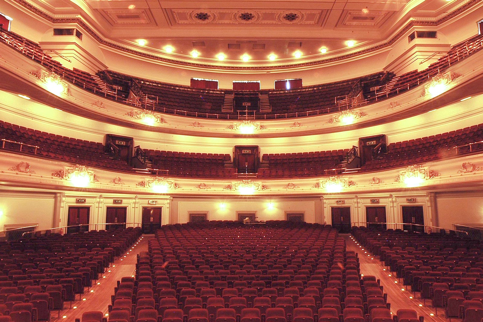 Grand Usher Hall auditorium with tiered seating, perfect for conferences and performances.