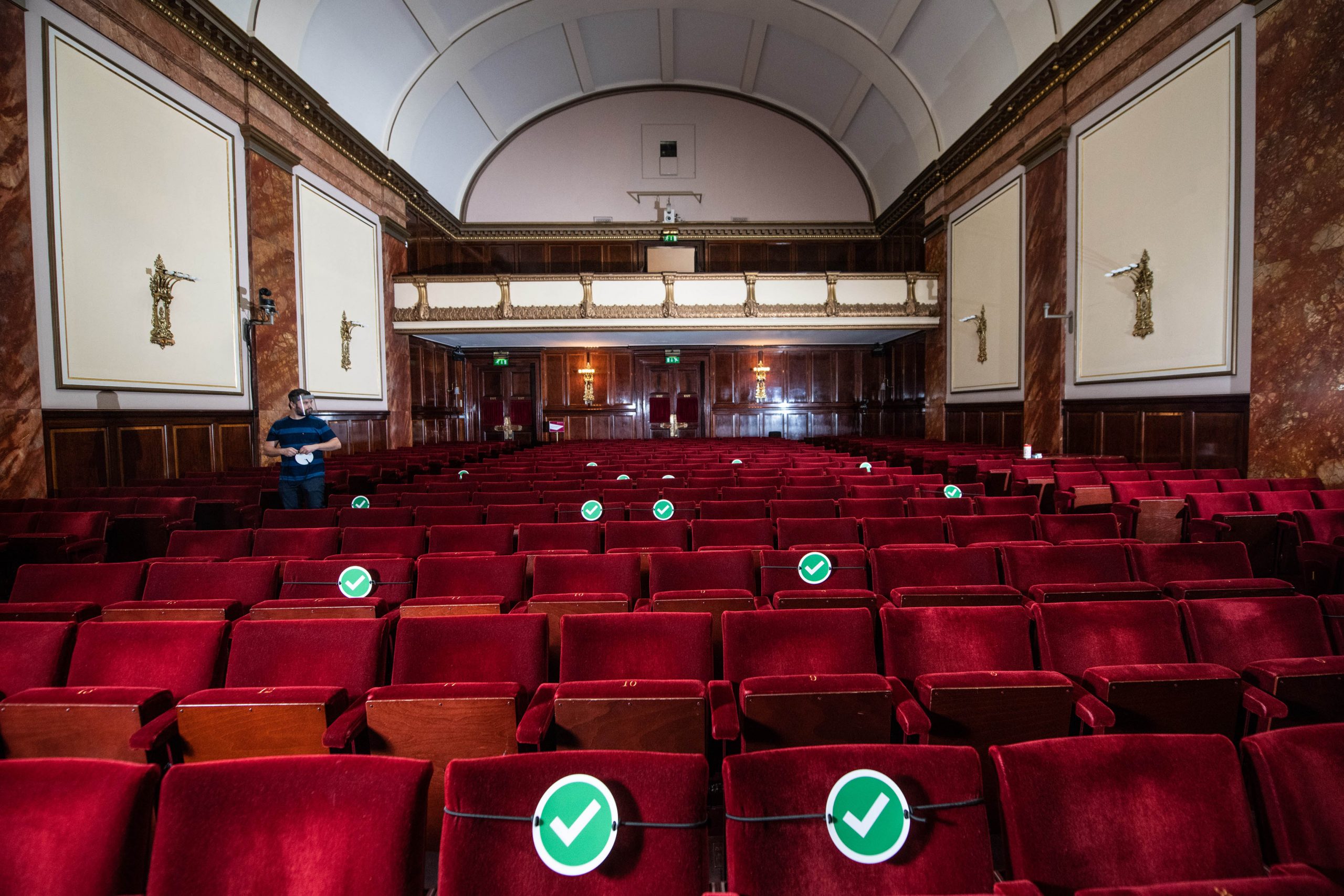 Wigmore Hall auditorium with plush red seating for conferences and performances.