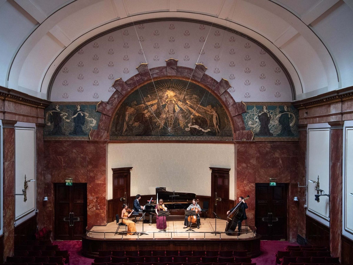 Elegant Wigmore Hall auditorium with ornate architecture, ideal for concerts and corporate events.