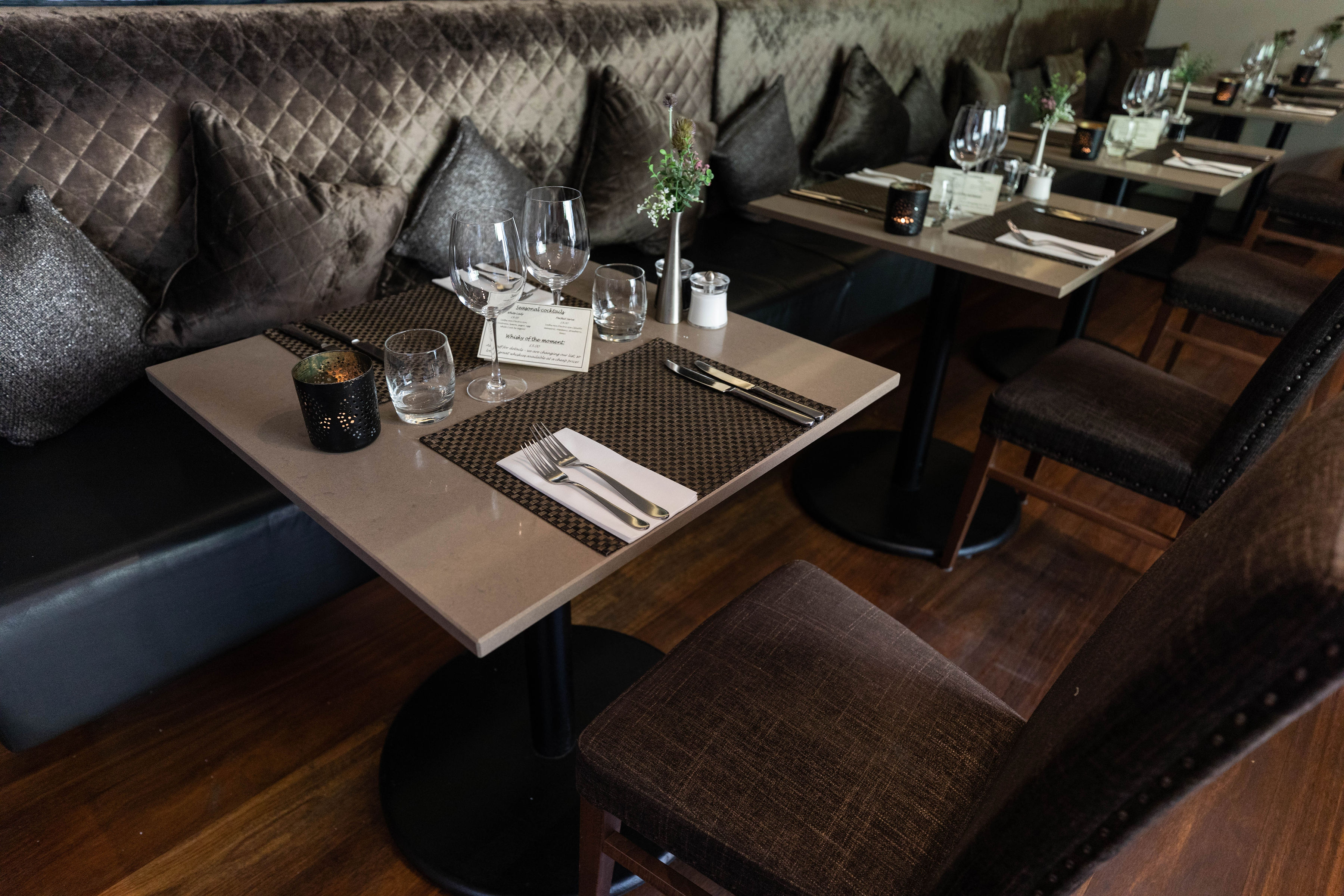 Elegant dining setup in Angels with Bagpipes for intimate gatherings and corporate events.