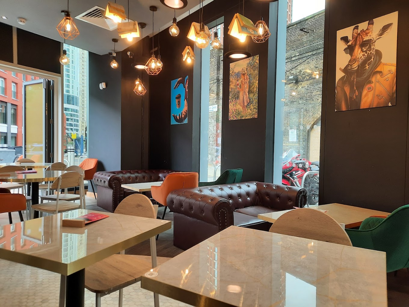 Stylish event space at Bru Coffee with cozy seating, ideal for networking and meetings.