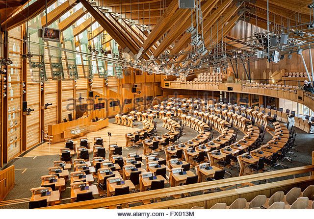 Modern Debating Chamber in BMA Scotland with tiered seating for conferences and meetings.