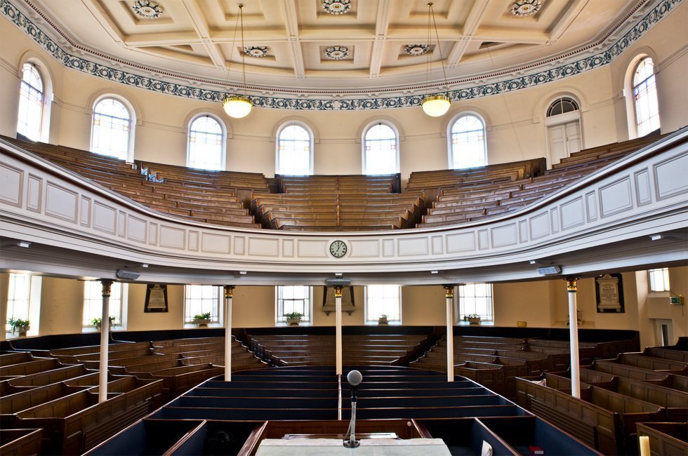 Historic auditorium with tiered seating, ideal for conferences and lectures.