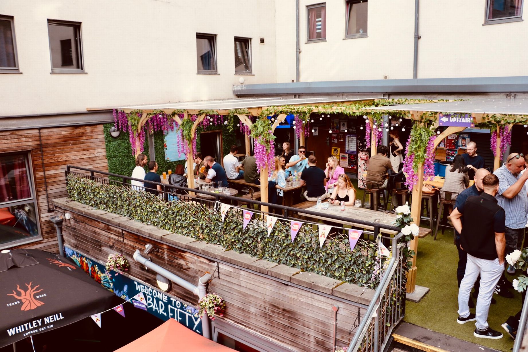 Vibrant Beer Garden at Bar 50, perfect for social gatherings and events.