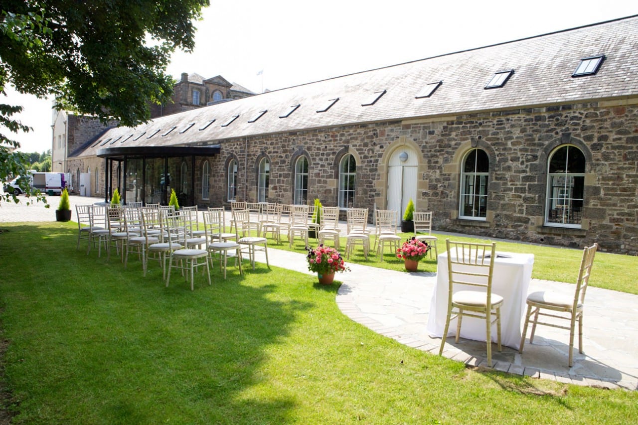 Elegant outdoor venue at Eskmills for weddings and corporate events, featuring manicured lawn.