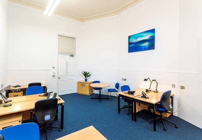 Boardroom at Capital Business Centre, minimalist design for workshops and meetings.